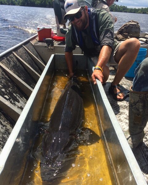 Quinn with a sturgeon